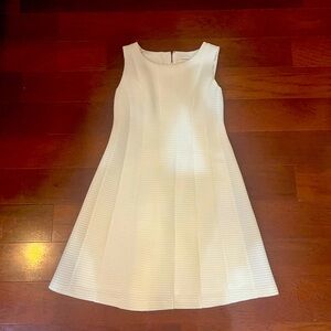 Calvin Klein size 10 white dress.  Material is crepe like.